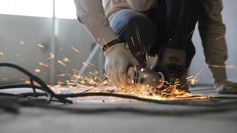 a person using a power tool