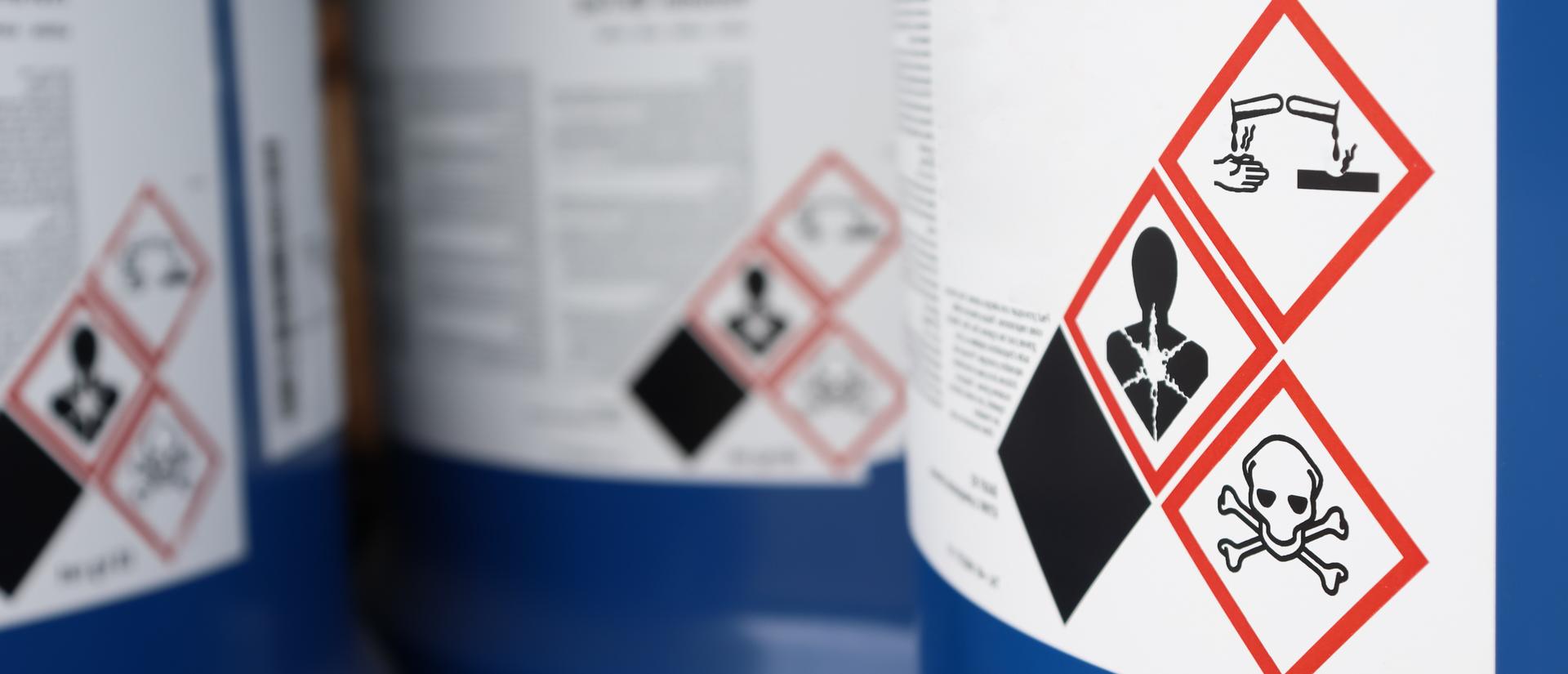 Hazard symbols on the chemical tank.